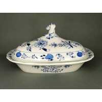 Antique porcelain serving bowl with blue onion pattern...