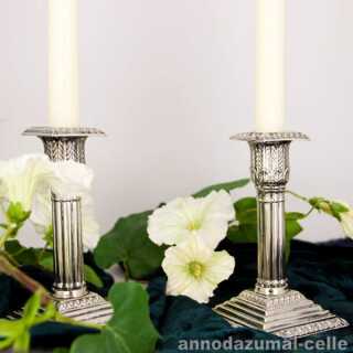 Antique column-shaped candlesticks
