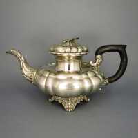 Antique early georgian silver tea pot with ebony handle...