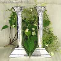 Column-shaped candlesticks in sterling silver