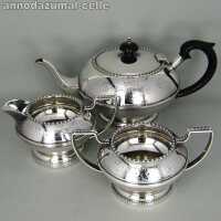 Silver plated tea set with bakelite handles