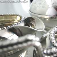 Silver plated tea set with bakelite handles