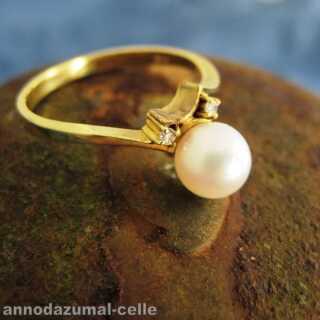 Delicate diamond and pearl gold ring