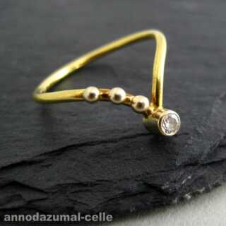 Delicate gold and diamond ring
