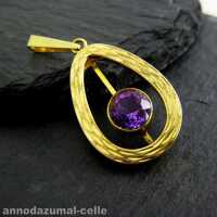 Open worked gold and amethyst pendant