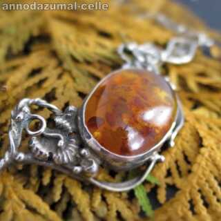 Floral collier with huge amber cabochon