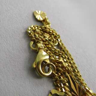 Wunderschönes Ketten Armband in Gold mit vielen Goldanhängern USA