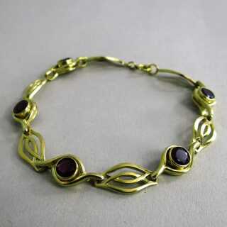 Beautiful ladies bracelet in gold with purple tourmalines