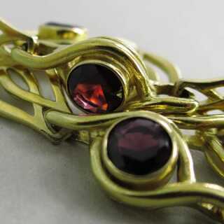 Beautiful ladies bracelet in gold with purple tourmalines