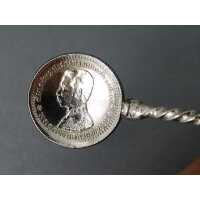 Antique silver spoon with bullet coinage