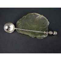 Antique silver spoon with bullet coinage