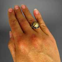 Außergewöhnlicher goldener Damen Ring mit kissenförmigen Saphiren