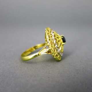 Wonderful open worked filigree ladys ring in gold with sapphire stone
