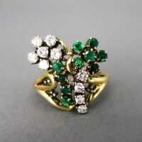 Floral design ladys ring with diamonds and emeralds...