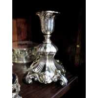 Silver candle stick with rich relief decor