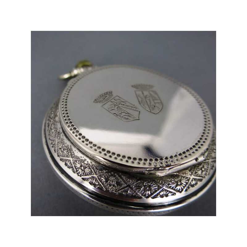 Pocket watchshaped silver pill box, 220,00