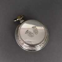Uhrenförmige silberne Pillendose mit Wappen