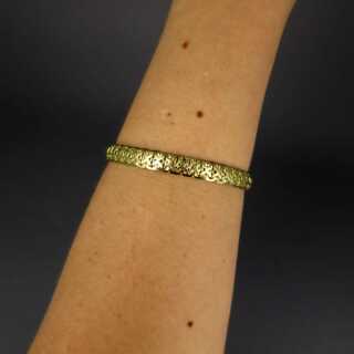 Goldenes Damen Armband im dekorativen Kreuzband-Design geflochten