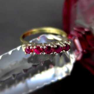 Vintage yellow and white gold stud ring with five rubies