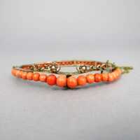 Early victorian bangle with coral and oriental pearls...