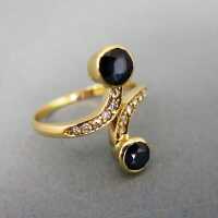 Gold ring with huge sapphire and diamonds