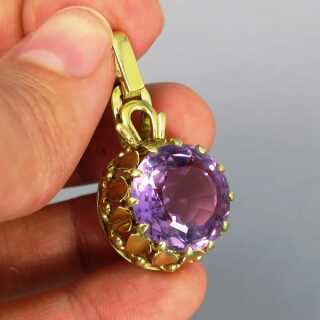 Round 14 k gold pendant with huge amethyst stone