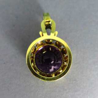 Round 14 k gold pendant with huge amethyst stone