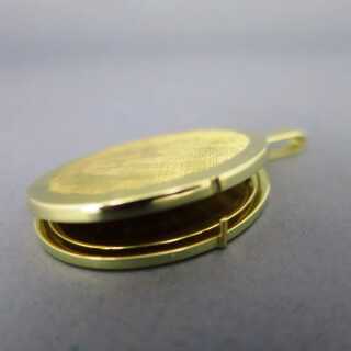 Goldenes ovales Medaillon für zwei Fotos