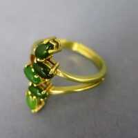 Beautiful gold ring with jade navettes
