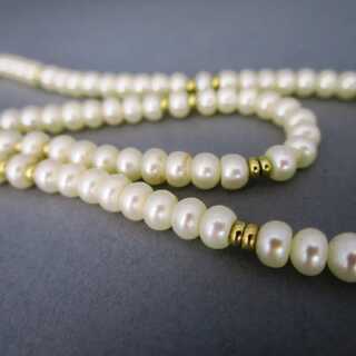 Nice pearl necklace with gold beads