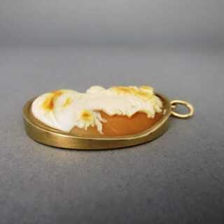 Antique pendant with shell cameo in gold mounting womans portrait