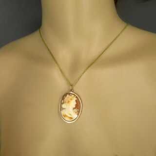 Antique pendant with shell cameo in gold mounting womans portrait