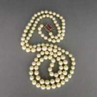 Akoya pearl necklace, rubies and white gold