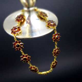 Beautiful gold and garnet flower link bracelet