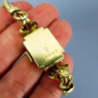 Exquisite ladys gold wrist watch with diamonds Knoll Pregizer 