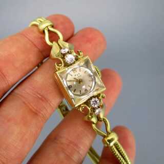 Exquisite ladys gold wrist watch with diamonds Knoll Pregizer 