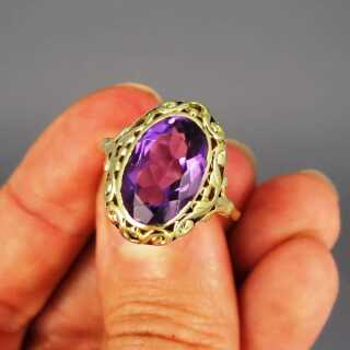 Unique vintage open worked ladys gold ring with huge oval amethyst stone