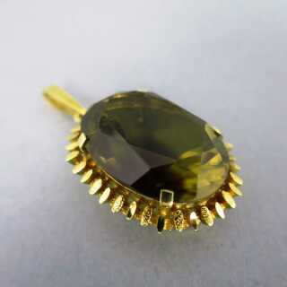 Ladys gold pendant with huge oval smoky topaz stone