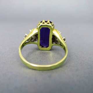 Gorgeous ladys ring with huge amethyst stone and diamonds in gold