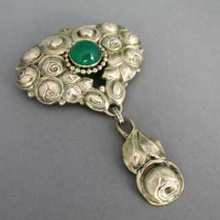 Beautiful Art Nouveau silver brooch with rose relief and chrysoprase cabochon