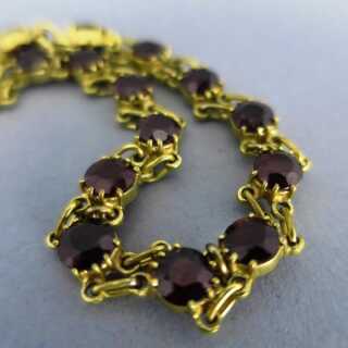 Antique gold link bracelet with deep red garnet stones
