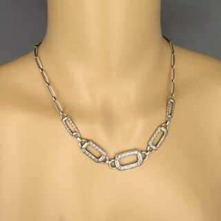 Abstract silver necklace with spiral decor