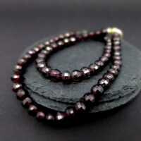 Heavy faceted garnet beads necklace with silver closure