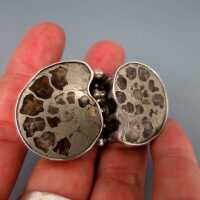 Vintage designer brooch in silver with fossilised ammonites