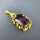 Charming open worked 14 k gold pendant with deep violett amethyst stone 