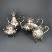 Rich decorated 4-pieces  tea and mocha set in silver...