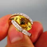 Unique ladys  ring in gold with a huge deep yellow citrine stone and diamons 