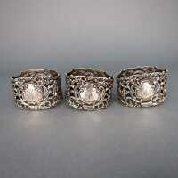 Drei wunderschöne antike Serviettenringe Silber...