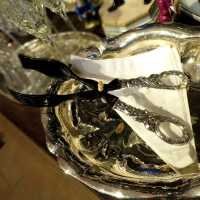 Rich decorated antique serving tongues silver plated metal horn an bone repoussé