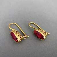 Beautiful delicate gold earrings with pink spinel...